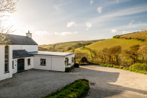 Lakeview Farmhouse courtyard overlooking the green valley