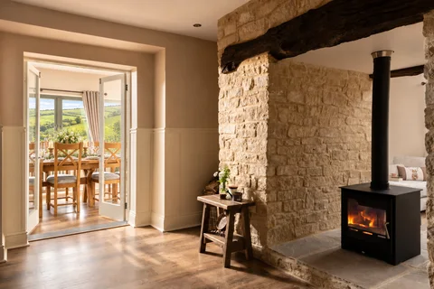 View through the Farmhouse doorway towards the sun room and dining table