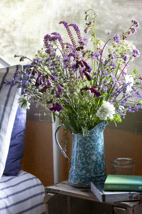 A vase of lavender in the Safari Lodge interior