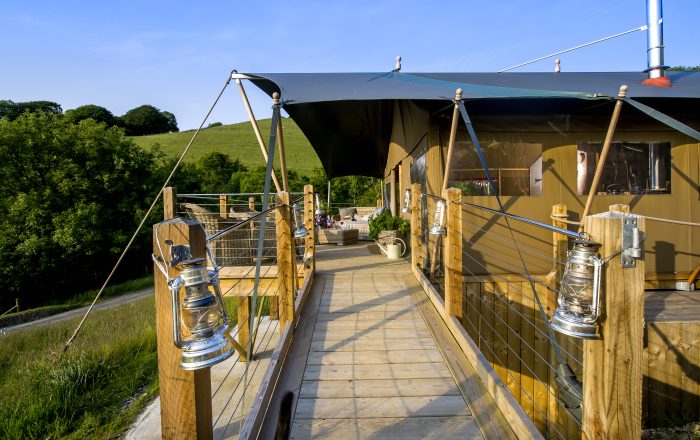 Luxury safari lodge with private deck and countryside views at Longlands Devon