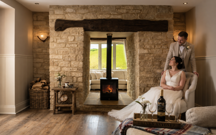 Bride and Groom in a centuries old North Devon Farmhouse having wedding photos